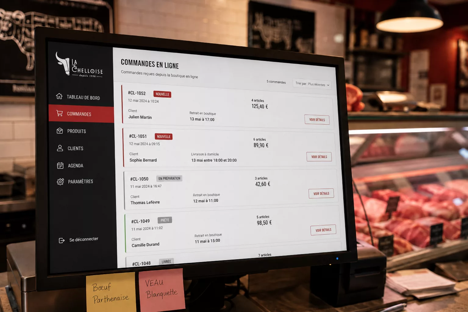 Ecran de caisse de boucherie montrant l'application de gestion des commandes